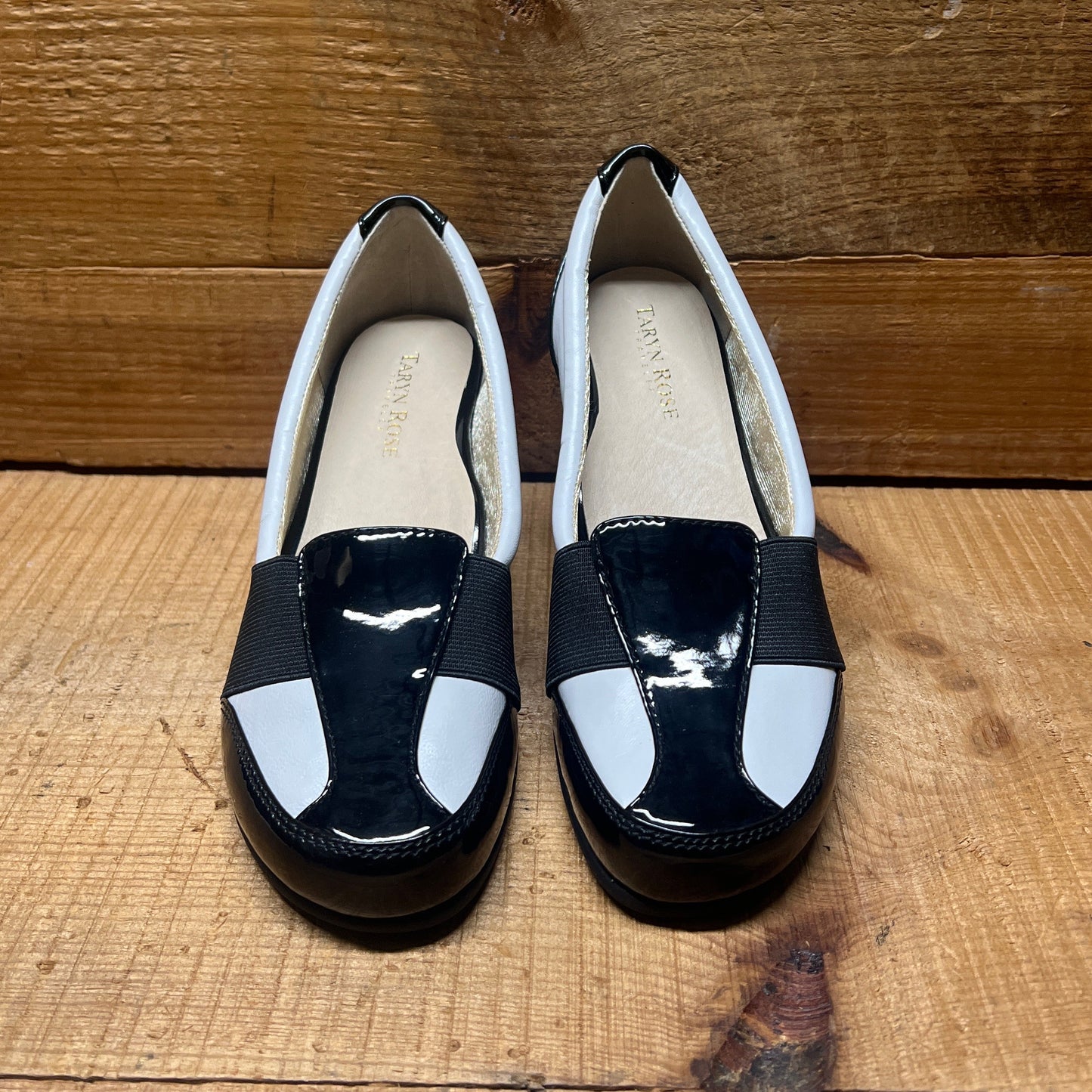 Women’s Taryn Rose - Traveler •Taurus •Elastic-gore Leather Slip on 6M  White Napa/Black Patent