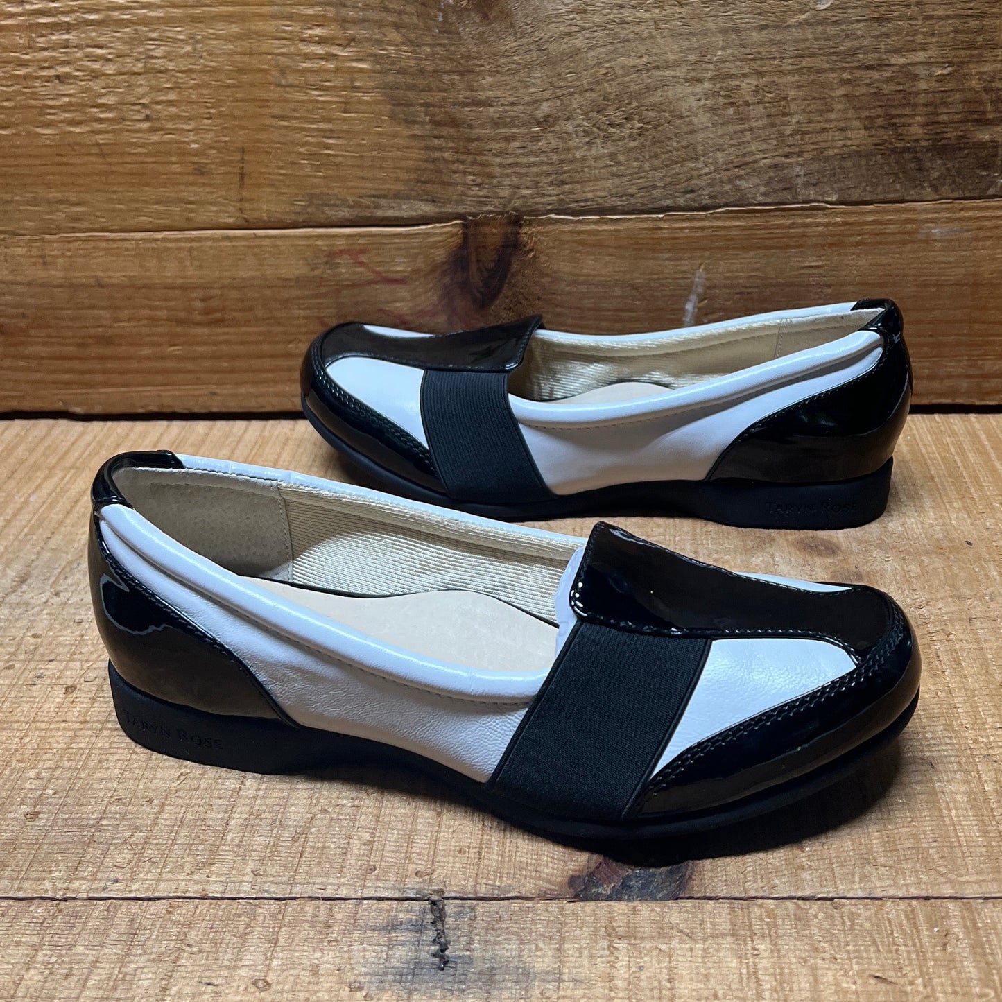 Women’s Taryn Rose - Traveler •Taurus •Elastic-gore Leather Slip on 6M  White Napa/Black Patent
